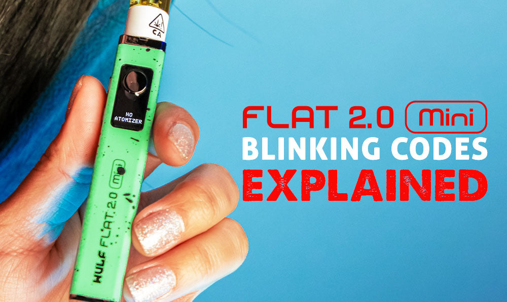 woman holding the Flat 2.0 Mini with blue background and red and white text